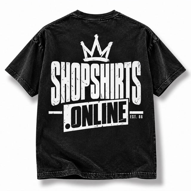 Black vintage wash Improper Cotton T-shirt featuring a distressed white ShopShirts.online crown graphic with EST. 86 branding on the back, displayed solo on a clean white background with a soft natural shadow.