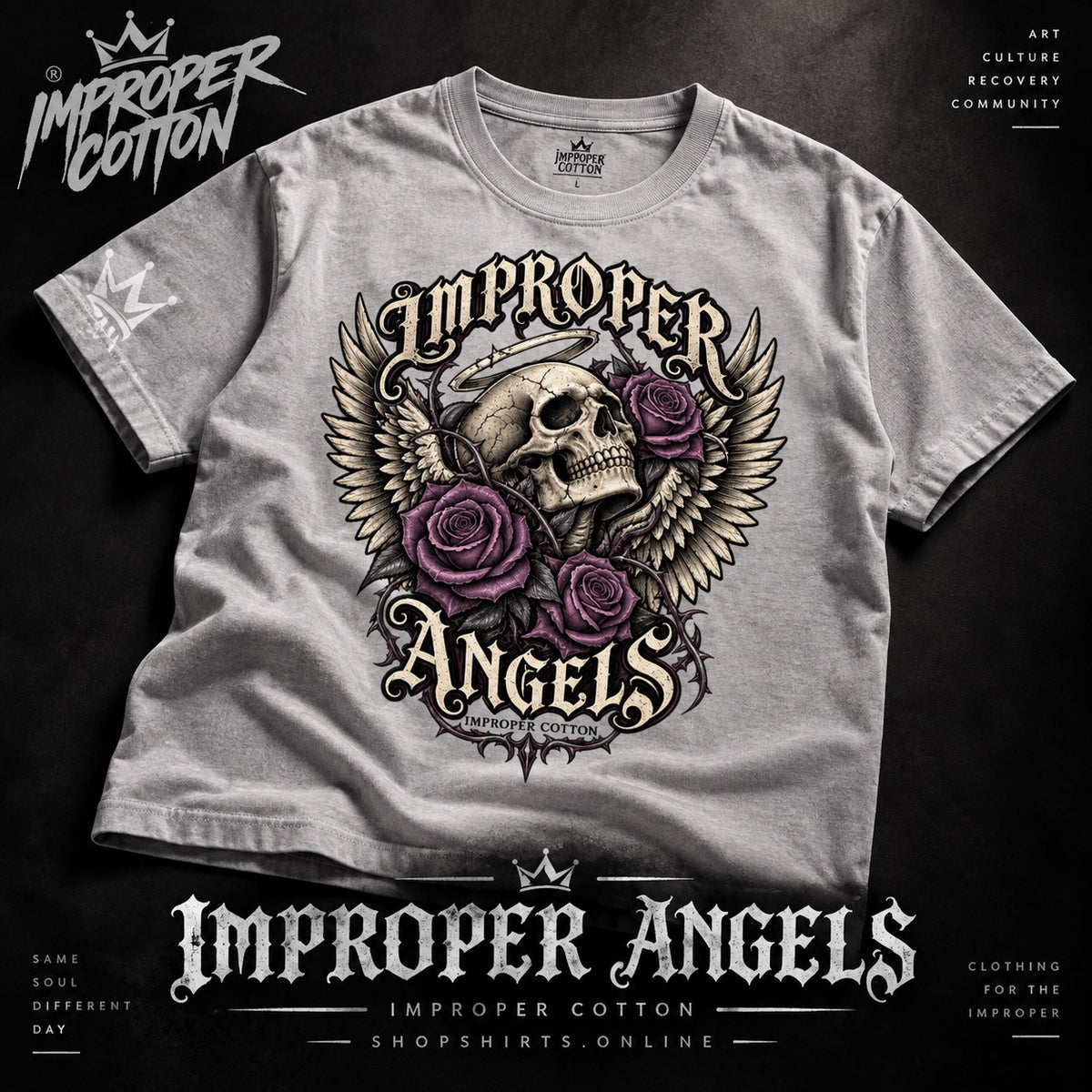 A heather gray t-shirt featuring a large graphic print of a skull with angel wings and purple roses, with the text 'IMPROPER ANGELS' in gothic lettering. The shirt is displayed on a dark background with promotional text for 'Improper Cotton' and 'Improper Angels'.