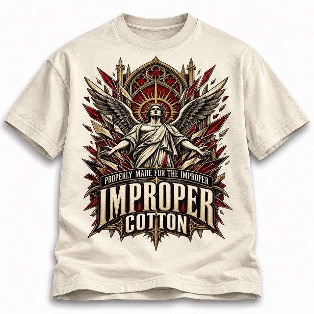 An off-white crewneck t-shirt featuring a large graphic print of an angel with wings and the text 'PROPERLY MADE FOR THE IMPROPER IMPROPER COTTON' in a bold, vintage-style font.