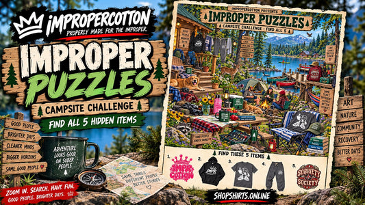 Improper Puzzles Campsite Challenge by ImproperCotton featuring a detailed lakeside camping scene with five hidden ImproperCotton and sobriety-themed items to find.