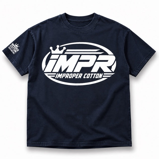 Navy IMPR Improper Cotton graphic T-shirt featuring a bold white crown logo and racing-inspired oval design, displayed solo on a clean white background with a soft shadow.