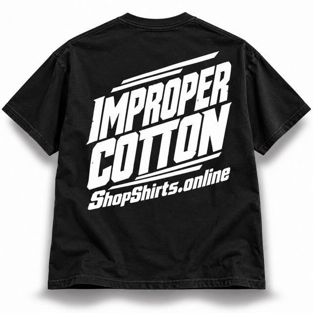 A black short-sleeve t-shirt shown from the back, featuring a large white graphic print that reads 'IMPROPER COTTON' with 'ShopShirts.online' underneath, on a plain white background.