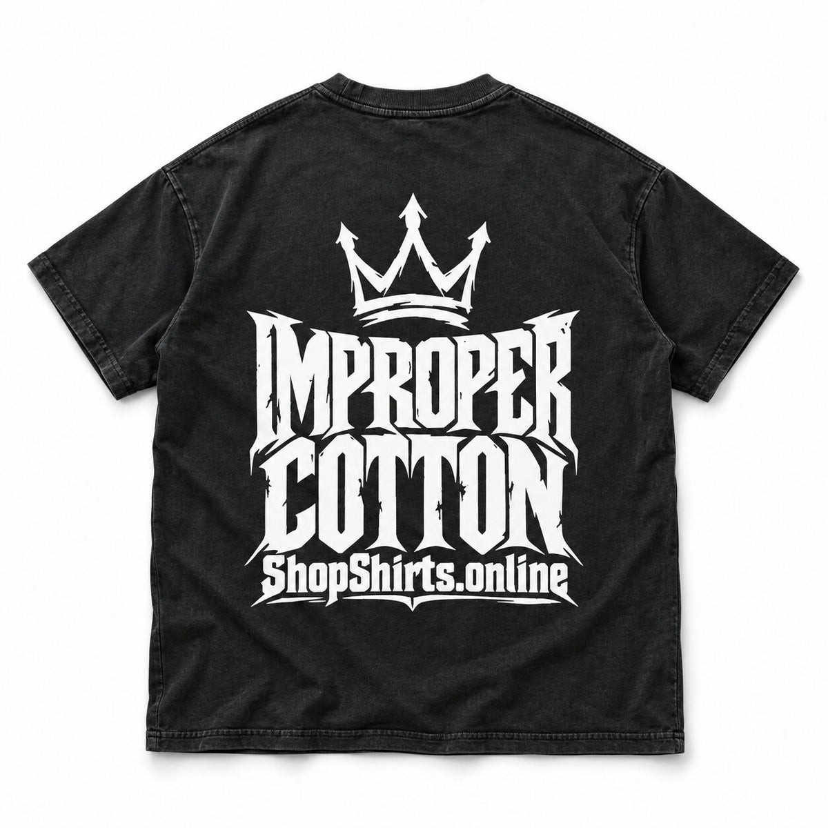 Back of a black vintage-wash graphic T-shirt featuring a large white crown, distressed Improper Cotton lettering and ShopShirts.online branding on a clean white background.