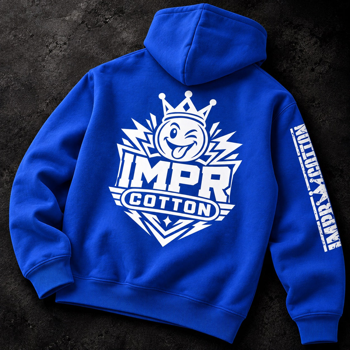 Two-panel IMPROPER COTTON royal blue Soberwear hoodie promo showing the front Soberwear logo and back IMPR Cotton crowned smiley graphic with branded sleeve details.