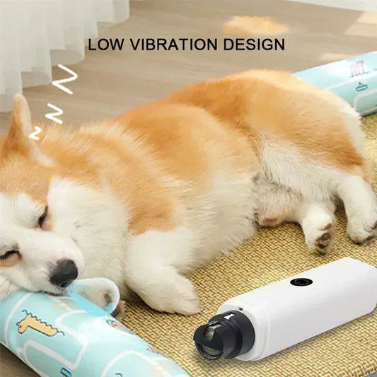Dog lying on a mat with a low vibration device next to it, labeled 'Low Vibration Design'.