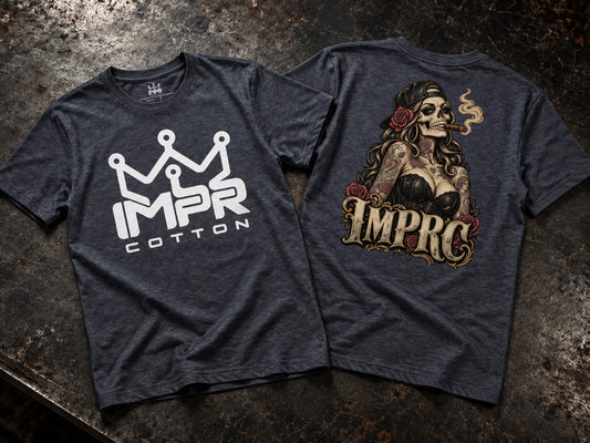 Two dark heather gray t-shirts displayed flat on a textured dark surface, showing the front and back designs. The front features a white crown logo above the text 'IMPR' and 'COTTON'.