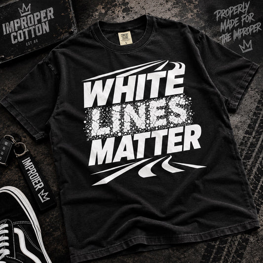 White lines matter black Graohic tees laying on a table by improper cotton ShopShirts online