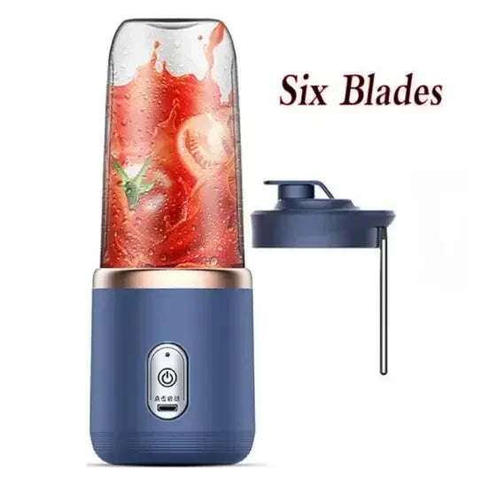 Blue portable blender with six blades, containing a red smoothie, on a white background.