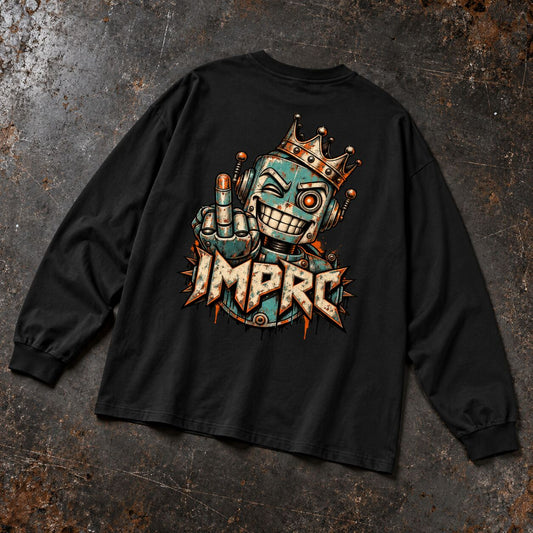 A black long-sleeve t-shirt laid flat on a textured, dark metallic background. The back of the shirt features a large graphic print of a cartoon robot wearing a crown and giving the middle finger, with the word 'IMPRC' written in a stylized metallic font below.