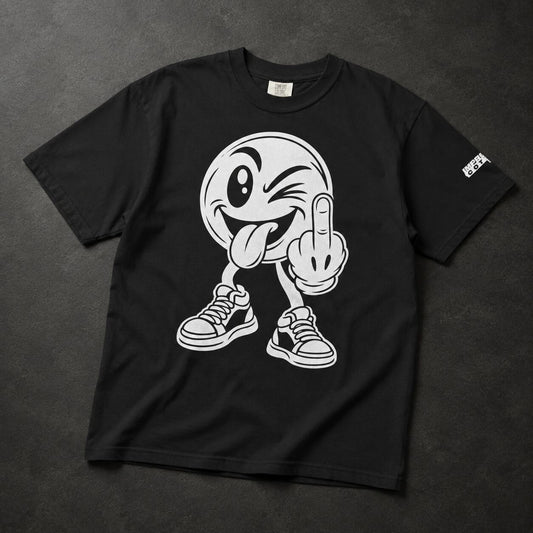 A black short-sleeve t-shirt laid flat on a dark textured background, featuring a large white graphic of a winking cartoon face with its middle finger and sneakers. A small white logo is printed on the left sleeve.