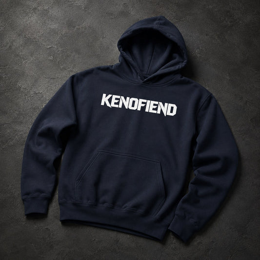 A navy blue pullover hoodie with the word 'KENOFIEND' printed in bold white letters across the chest, laid flat on a dark textured background.