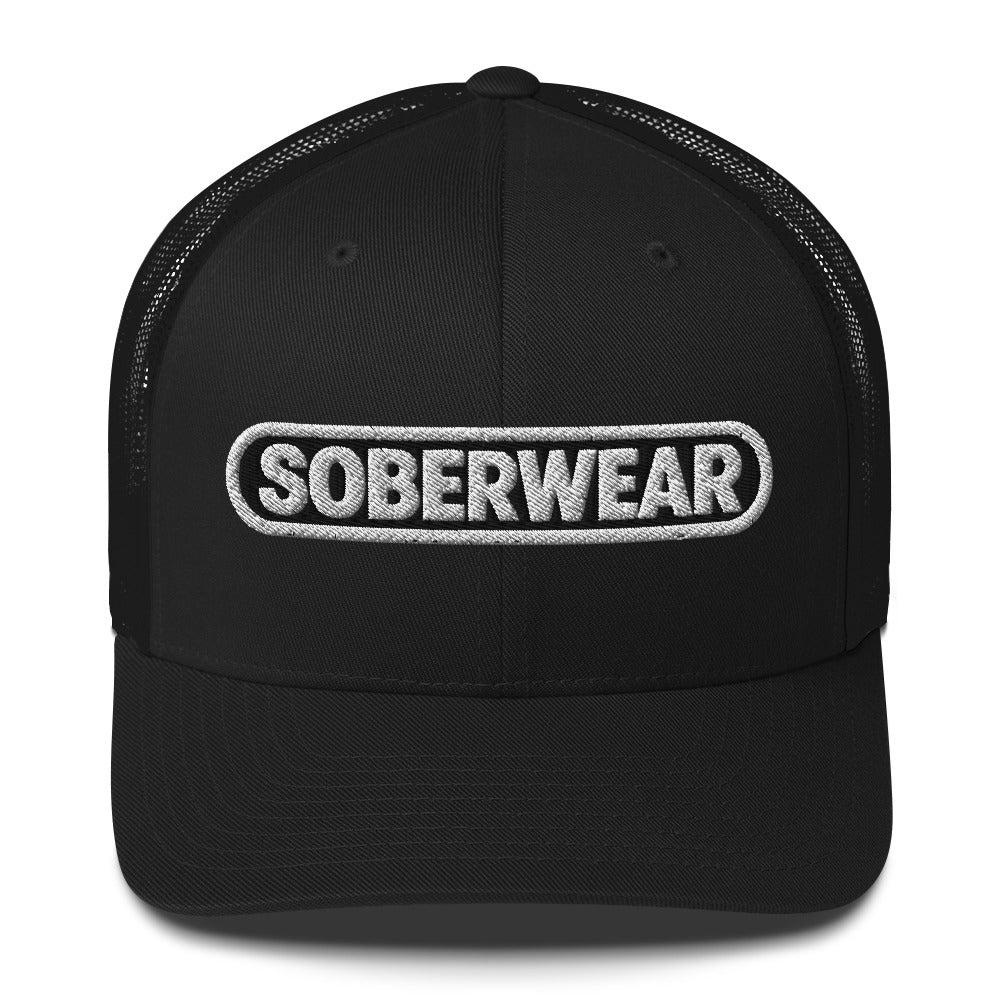 A black trucker-style cap with a curved brim and black mesh back, featuring a white embroidered 'SOBERWEAR' logo on the front, shown against a plain white background.