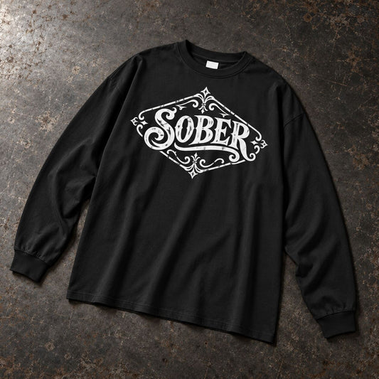 SOBERWEAR black Longsleeve premium tee shirt laying on table