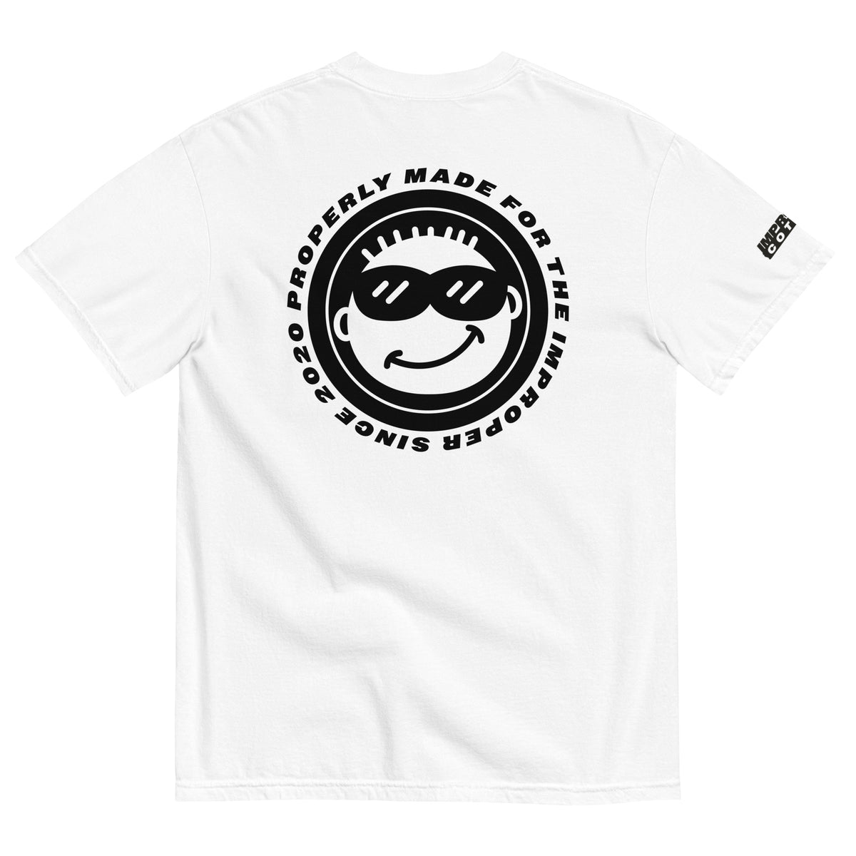 White short-sleeve t-shirt shown from the back, featuring a large black circular graphic with a smiling face wearing sunglasses and the text 'PROPERLY MADE FOR THE IMPODER SINCE 2020'. A small black graphic is printed on the left sleeve.